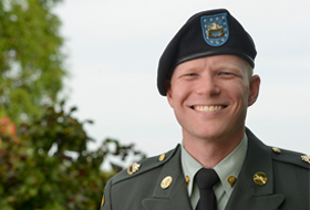 Veteran student standing outside library at La Roche Colelge